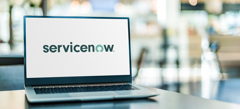 laptop with the servicenow logo on the screen